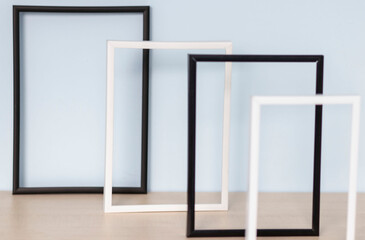 Frames in place with a mask and a leaf on a white background. Frames on a white background. Many frames. Leaves in a frame. Mask in a frame.