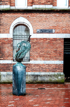 Rory Gallagher Monument by Geraldine Creedon, in Rory Gallagher Place in Cork, Ireland, with a bronze sculpture in honor of the Irish blues and rock musician Rory Gallagher.