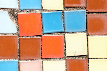 Background from Mosaics of different colors from square tiles.