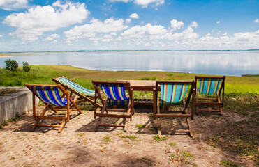chair on the sky background. chair against the sky beside the waterfront