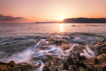 Fototapeta premium Rocky coastline of Corsica at dawn