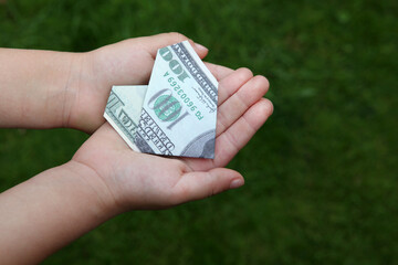 image of money hand grass background 