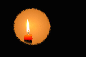 Fototapeta premium Circle of candle light in the dark foreground