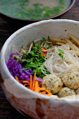 Homemade Vietnamese vegan noodles soup, colorful vegetables, tofu balls, delicious, nutrition, healthy vegetarian dish bowl