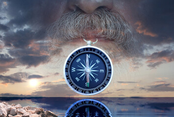 Abstract photo of part of face of man with compass against the sunset as symbol of tourism with compass, travel with compass and outdoor activities with compass