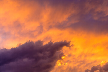sunset plays with colors in the sky and clouds