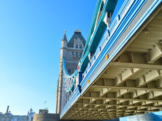 London tower bridge view from a bottom end with blue sky as background © NNPhotos