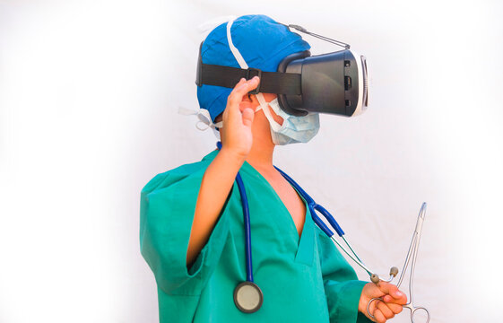child dressed as a doctor with virtual reality glasses - Powered by Adobe