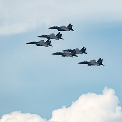 RSAF F-15SG fighter jets formation flyby for National Day Parade at Singapore. - obrazy, fototapety, plakaty