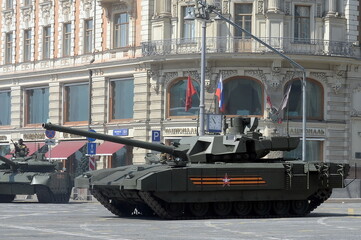 Russian t-14 Armata battle tank on a heavy tracked platform on Tverskaya street during the dress rehearsal of the parade dedicated to the 75th anniversary of Victory