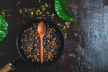 Roasted coffee beans on a wooden table
