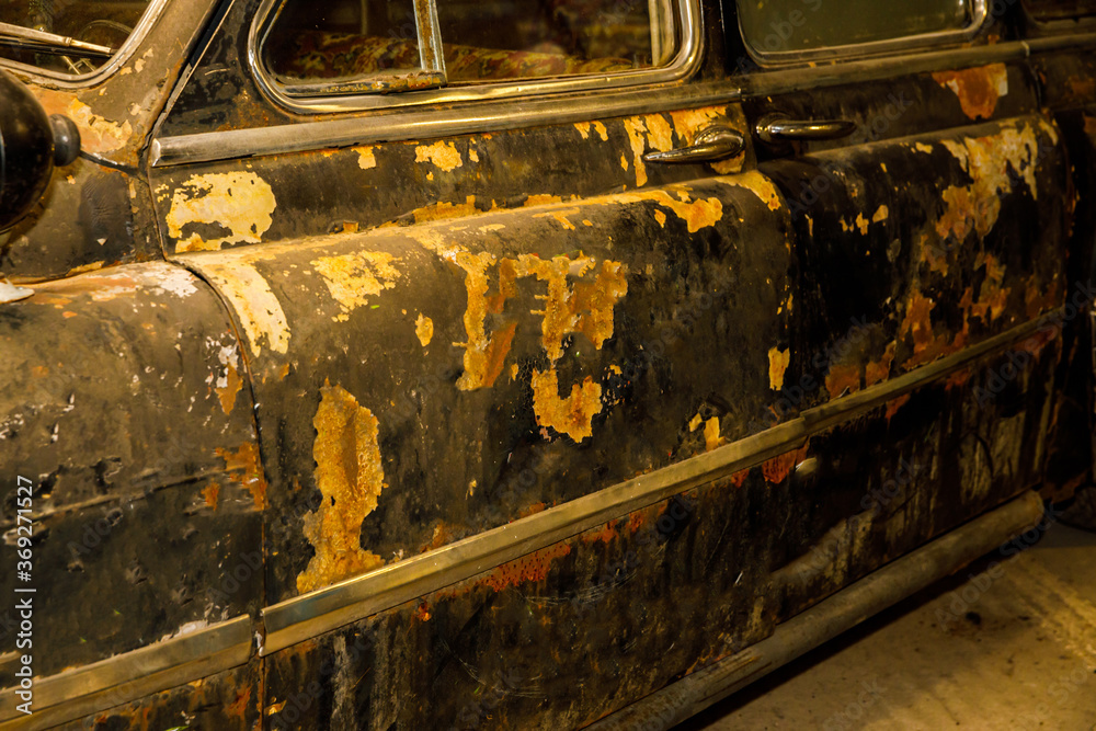 Poster old rusty retro car of black color.