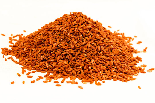 Uzbek rice devzira of red-brown color, intended for the preparation of pilaf.