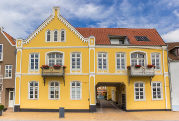 Fototapeta na wymiar Old yellow house in the historic harbor of Sonderborg, Denmark