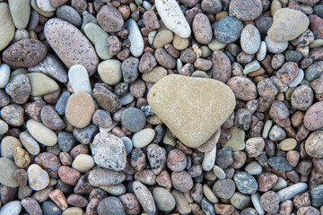 Love concept photo. Limestone and granite gravel background
