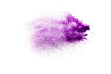 Purple color powder explosion on white background.Purple dust particles splash.
