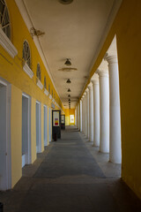 Old colonnade in the red rows of shopping malls in Kostroma Russia close up