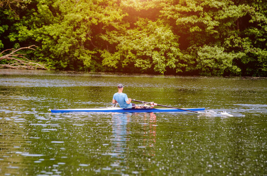Man floating in a canoe on the river
