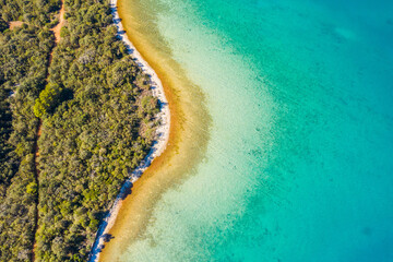 Aerial view of Adriatic coastline in Croatia, Dugi otok island. Pine woods, long hidden secret beaches and emerald sea surface, touristic paradise