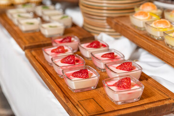 Tasty dessert on the wooden plate