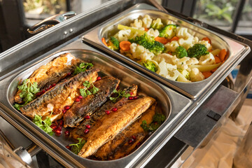 Fish meal and salad close up