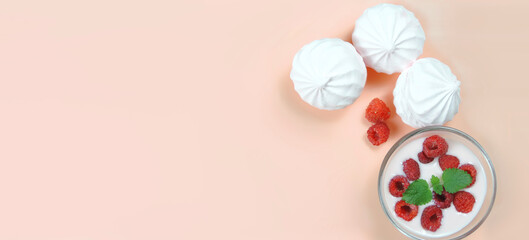 raspberry smoothie with mint and marshmallow on pink background, great for banner