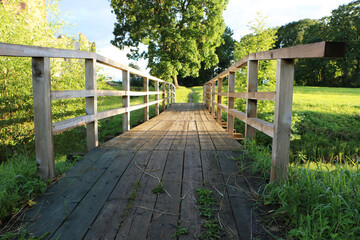Old vintage wooden footbridge. The architecture is an old wooden bridge.