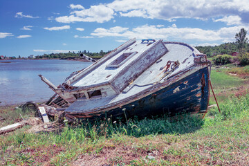 Old Fishing Boat in Decay - A well used fishing boat well past it's prime lays rotting on the Atlantic coast of Nova Scotia.