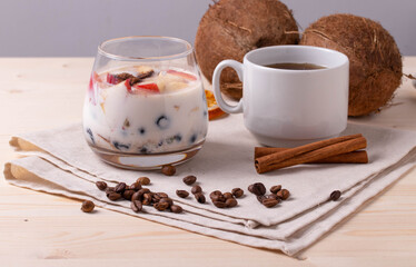 espresso in a cup and milky desert with fruit