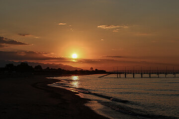 sunset at sea. variety of colors and hues of the rising sun