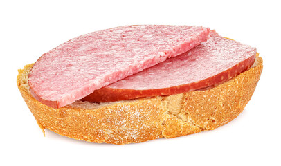 Piece of fresh rye bread with two slices of smoked sausage isolated on white background