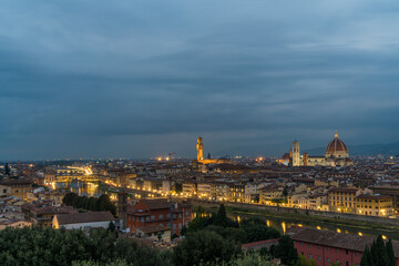Fototapeta na wymiar Florence old city skyline at night with Ponte Vecchio over Arno River and Cathedral of Santa Maria del Fiore in Florence, Tuscany, Italy.