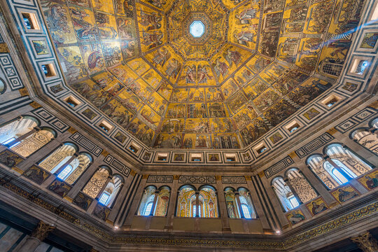 Florence, Italy - October 4, 2017 :  Mosaic-covered interior of the octagonal dome in Baptistery of Saint John in Florence, Italy