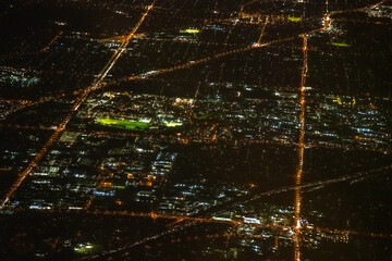 Melbourne, Australia. Aerial view of city skyline at night from the airplane