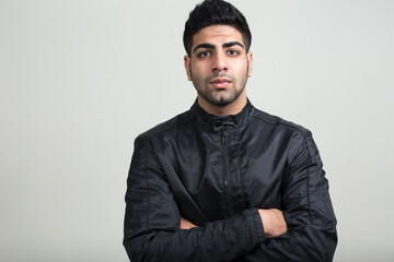 Obraz premium Portrait of young handsome bearded Indian man