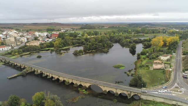 Salamanca.  Bridge in river. Village of Alba de Tormes, Spain. Aerial Drone Footage