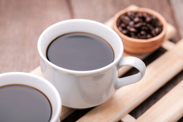 Two Cups of Hot Black Coffee