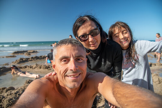 Hppy Family Taking Selfie In Hot Water Beach, New Zealand