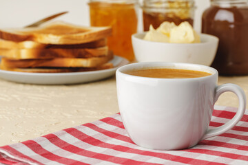 White porcelain cup with fresh coffee close up