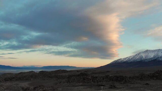 Cinematic aerial flyover of rugged rock formation at Alabama Hills in Eastern Sierra in California