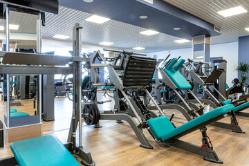 Fototapeta premium New sports equipment in a gym, nobody
