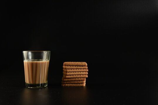 Indian tea (chai) with glucose biscuits