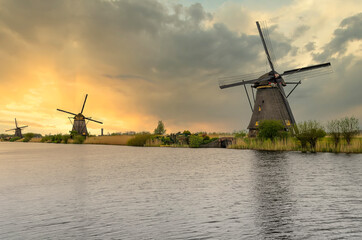 Fototapeta premium Windmills are the symbol of the Netherlands. Windmills are used in various fields of working