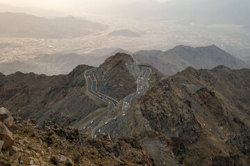 Traffic travelling around mountain pass on the zig zag road in Al Hada, Taif region of Saudi Arabia
