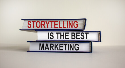 Books with text 'storytelling is the best marketing' on beautiful white background. Business concept. Copy space.