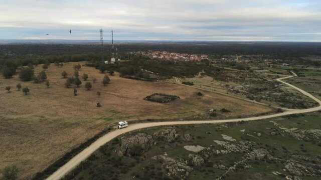 Road in rural area. Beautiful landscape in Spain. Aerial Drone Footage
