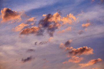 Clouds over the sky during the sunset in summer