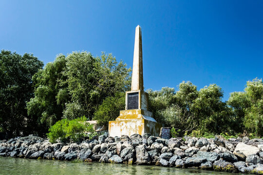 The obelisk in honor of king Carol I, Crisan village, Sulina branch. The Danube Delta, the second largest river delta in Europe. Romania.