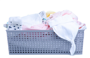 basket with laundry baby clothing on white background isolation