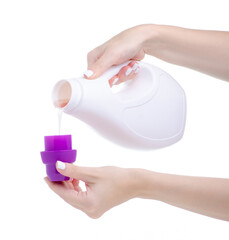 White plastic bottle for liquid laundry gel in hand on a white background isolation
